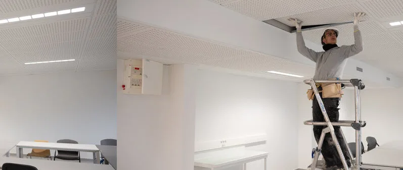 Un compagnon sur une plateforme individuelle roulante, travaillant en hauteur